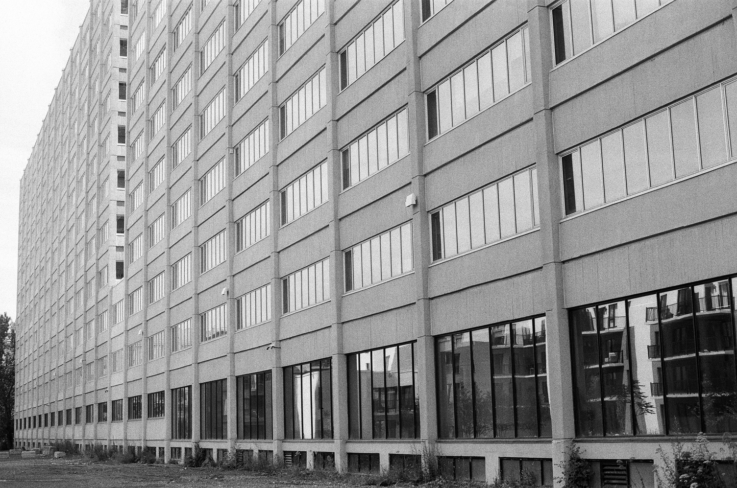 an unnecessarily large concrete block
of a building
that I'm pretty sure was once factories
but is now office space.
there are two sections about 11 storeys tall
separated by a narrow section
that is only 3.